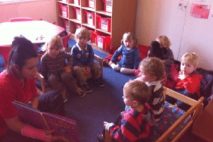 Image of children in a group reading session