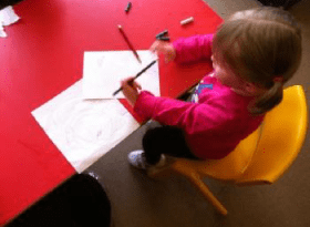 Image of child practicing written skills